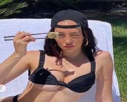 Sydney Carlson eating non vegetarian food